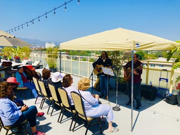 Sun is Out! We jumped at the first opportunity to have entertainment on the roof. Happy Spring!